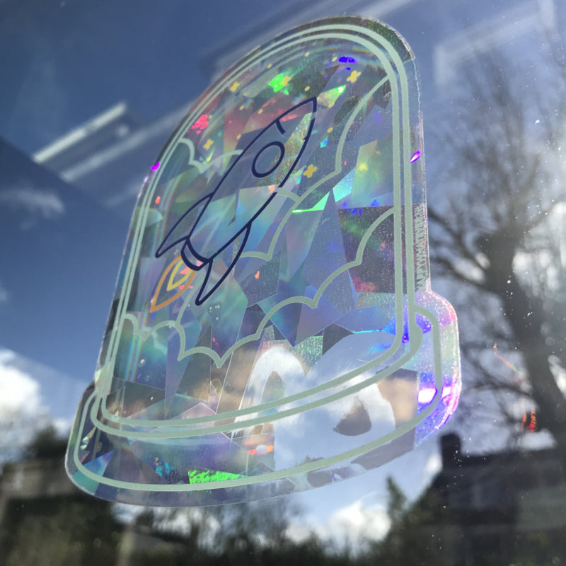 Regenboogmaker raamsticker Rocket A5